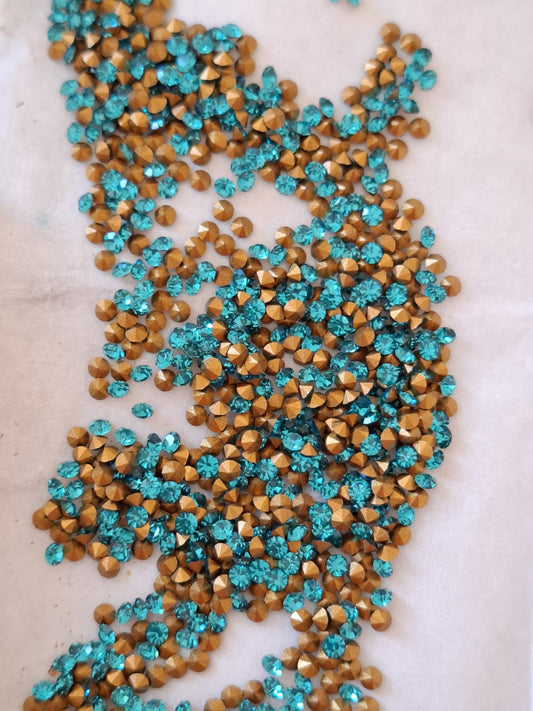 Swarovski® Chaton Vintage Blue Zircon Gold Foiled PP17