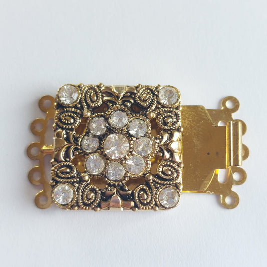 5227 Vintage Federverschluss mit Swarovski Kristallen 20x26mm