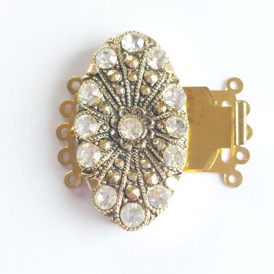 5226 Vintage Federverschluss mit Swarovski Kristallen 32×24mm