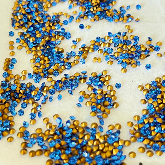 Swarovski® Chaton Vintage Sapphire Gold Foiled PP17