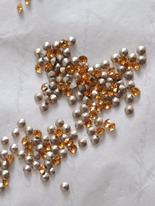 Swarovski® Chaton Topaz PP14